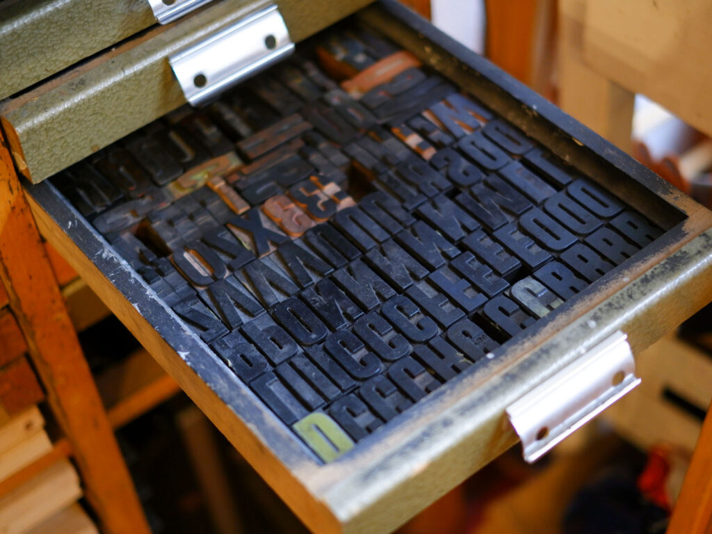 letterpress-letters-stored-in-shelf